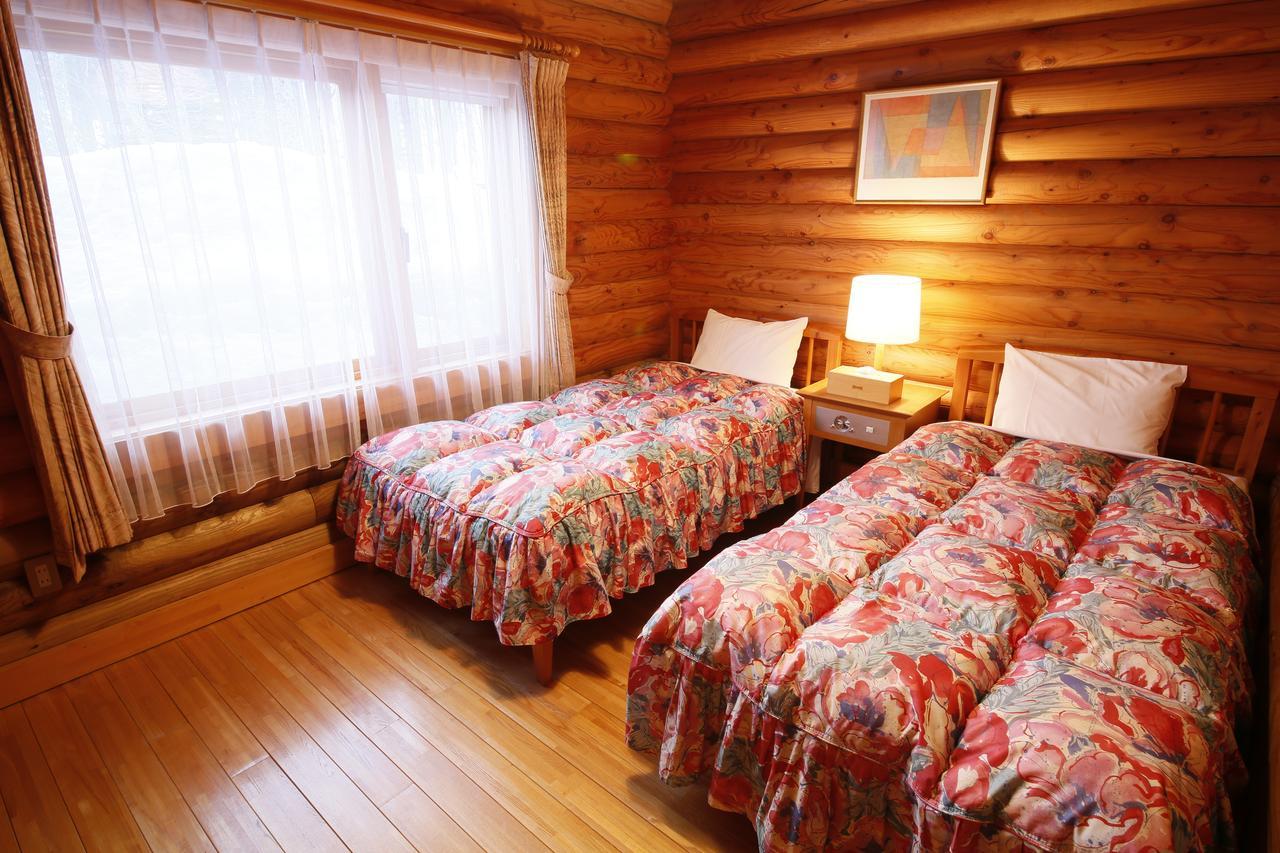 Log Hotel Larch Lake Kanayama Minamifurano Camera foto